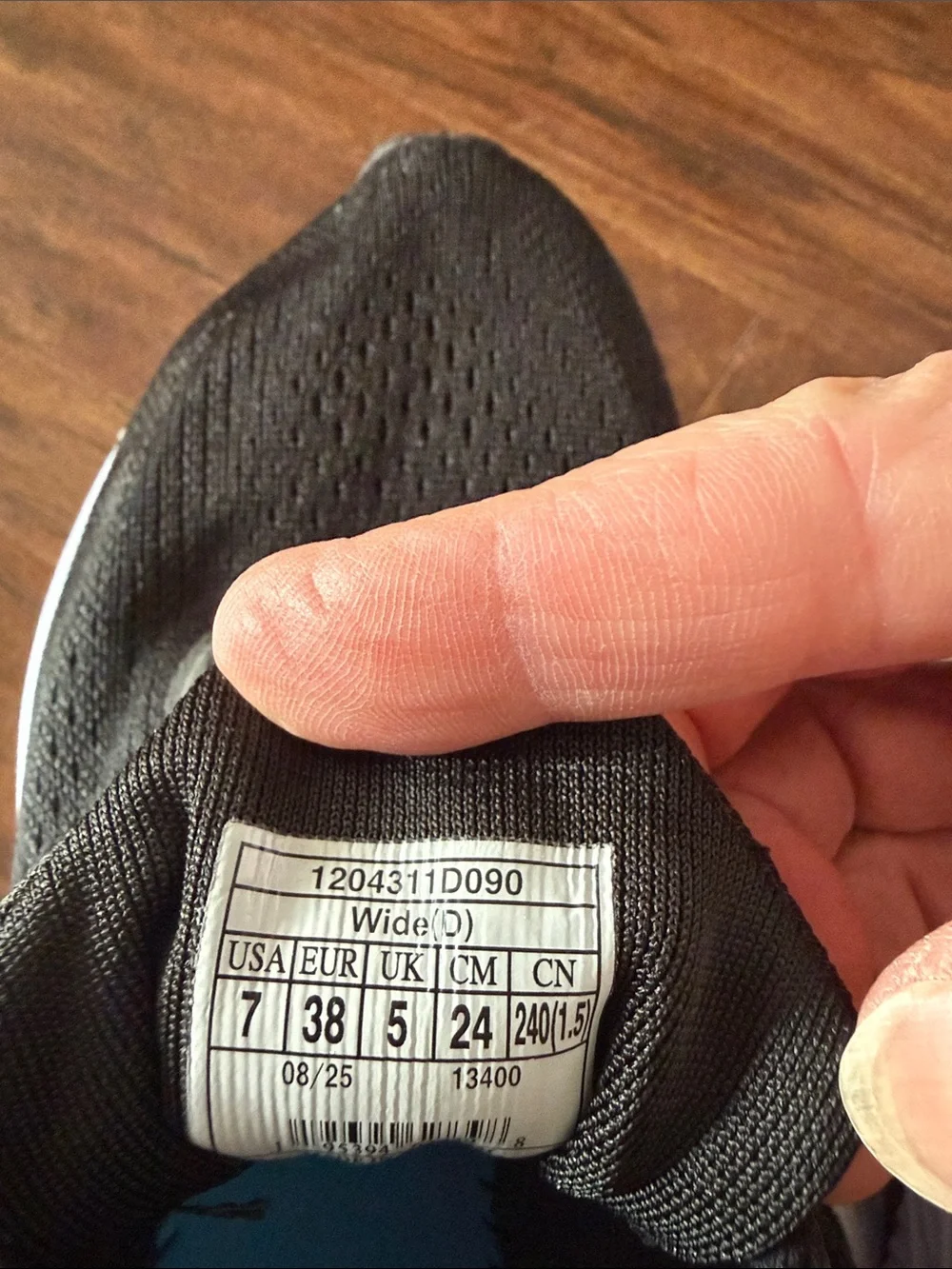 Black Athletic Running Shoes with White Midsole